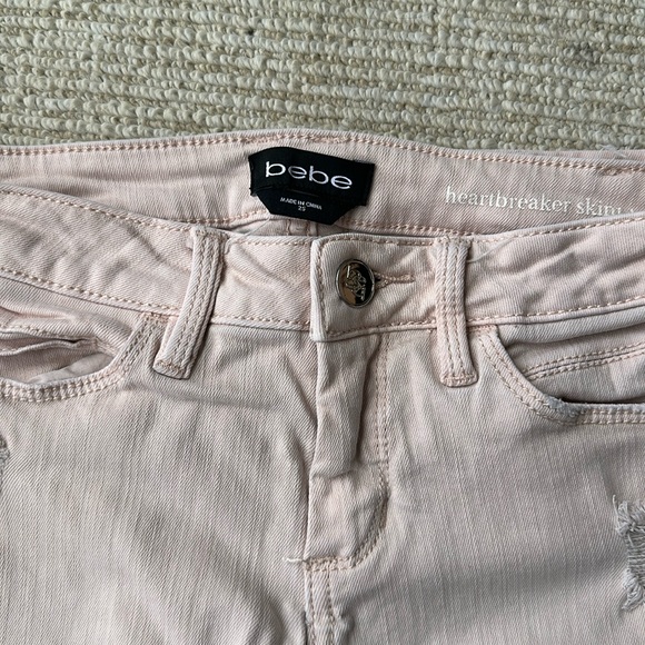 BEBE ripped skinny jeans. - Picture 2 of 4